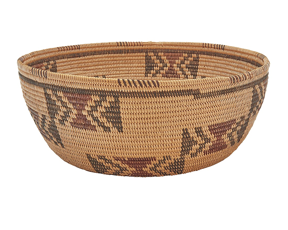 A Panamint Shoshone polychrome basketry bowl: A Panamint Shoshone polychrome basketry bowl Early 20th century; Great Basin The coiled bowl with partial rim ticking above a band and four arms of hourglasses, chevrons, and triangles issuing from ce