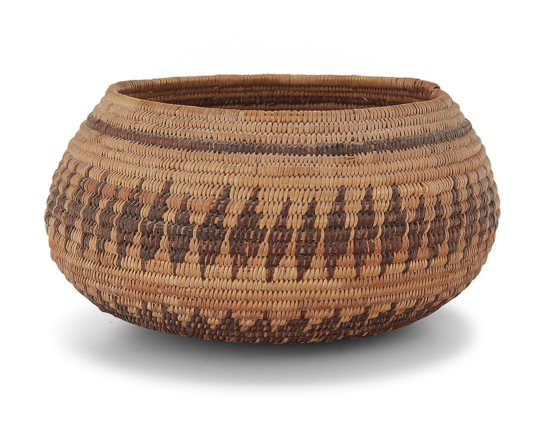 A Panamint Shoshone basketry bowl: A Panamint Shoshone basketry bowl Early 20th century; Great Basin The coiled basket of globular form with a single band above two serrated bands 3.375" H x 6.375" Dia. Provenance: The Robert Stuart Sc