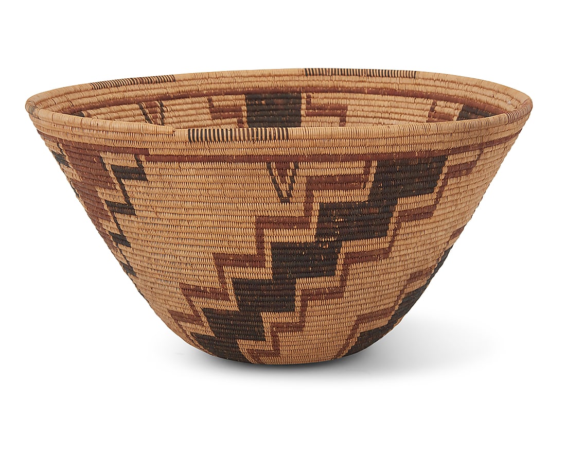 A Tubatulabal polychrome basketry bowl: A Tubatulabal polychrome basketry bowl Early 20th century; Southern Sierra, CA The coiled bowl with partial rim ticking above five radiating stepped arms issuing from center 5.25" H x 10" Dia.