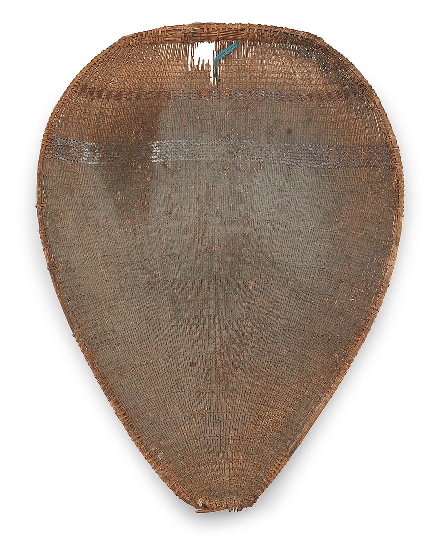 A Paiute winnowing tray: A Paiute winnowing tray Early 20th century; Great Basin With two bands, one of floating chevrons 4" H x 25" W x 18.5" D Provenance: The Robert Stuart Schaefer Collection, Independence, CA