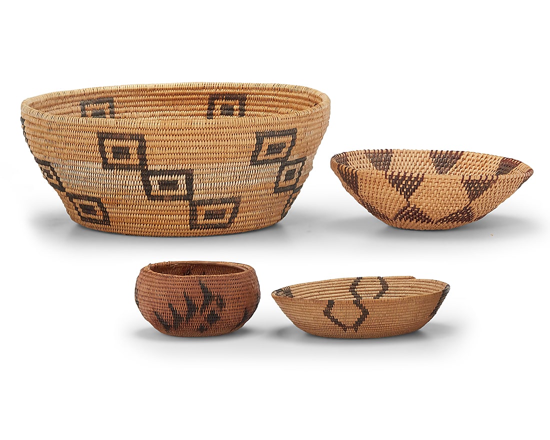 An assembled group of four Great Basin baskets: An assembled group of four Great Basin baskets Early 20th century; Northern California/Nevada The coiled vessels, comprising a Washoe basketry bowl with four designs issuing from rim, a large