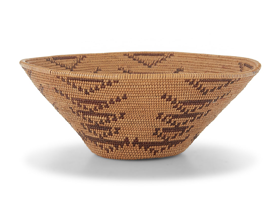 A Maidu basketry bowl: A Maidu basketry bowl Late 19th century; Northern California The coiled split-stitch bowl with very fine weaving, decorated with columns of stacked chevrons 2.625" H x 6.375" Dia. Provenance: Pacific