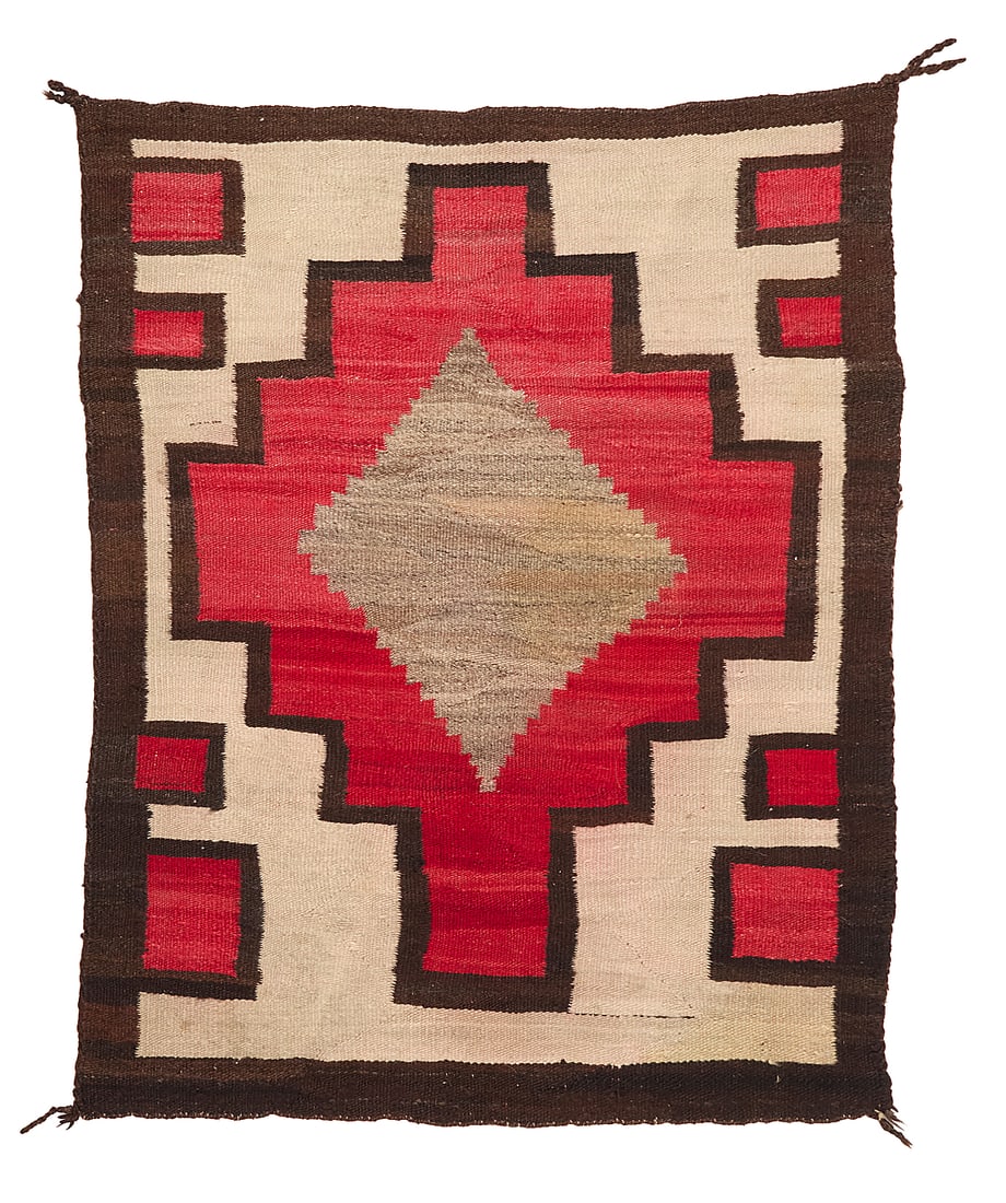 A Navajo regional rug: A Navajo regional rug Early 20th century, Dine Woven in dark brown, cream, red, and natural grey wool, with central stepped diamond with another stepped diamond 50.5" H x 40" W Provenance: From the