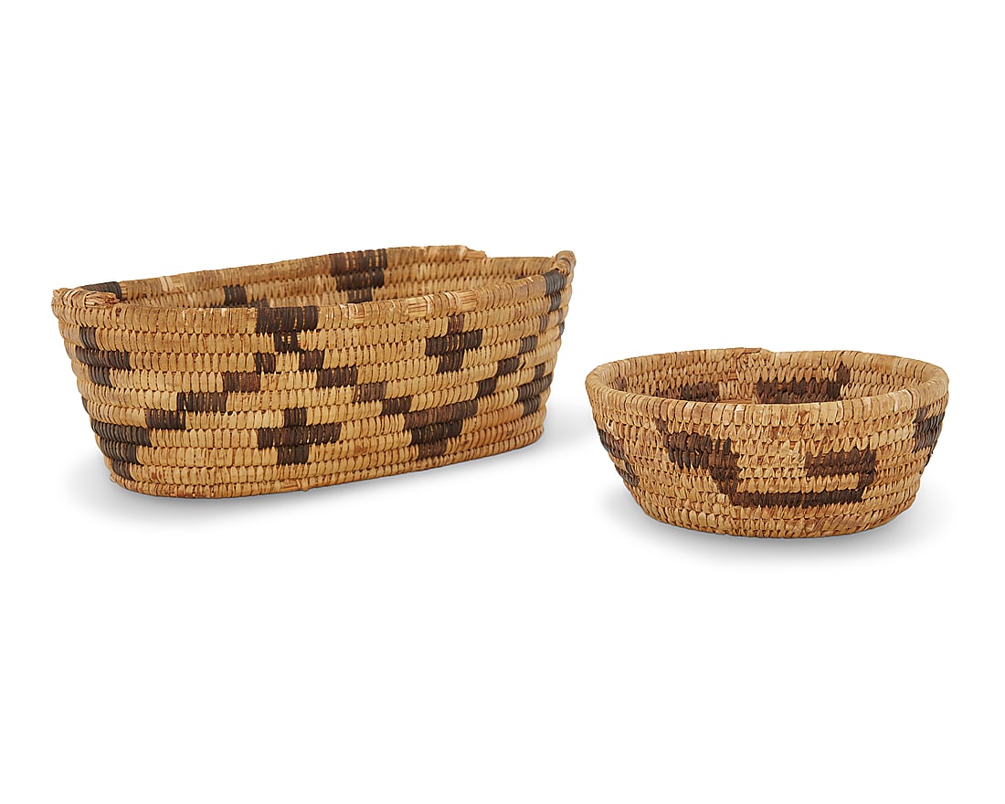 Two Papago baskets: Two Papago baskets Early/mid-20th century, Tohono O'odham; Arizona; Southwest United States The coiled baskets comprising one oval with a serrated band and floating crosses, and a circular with floati