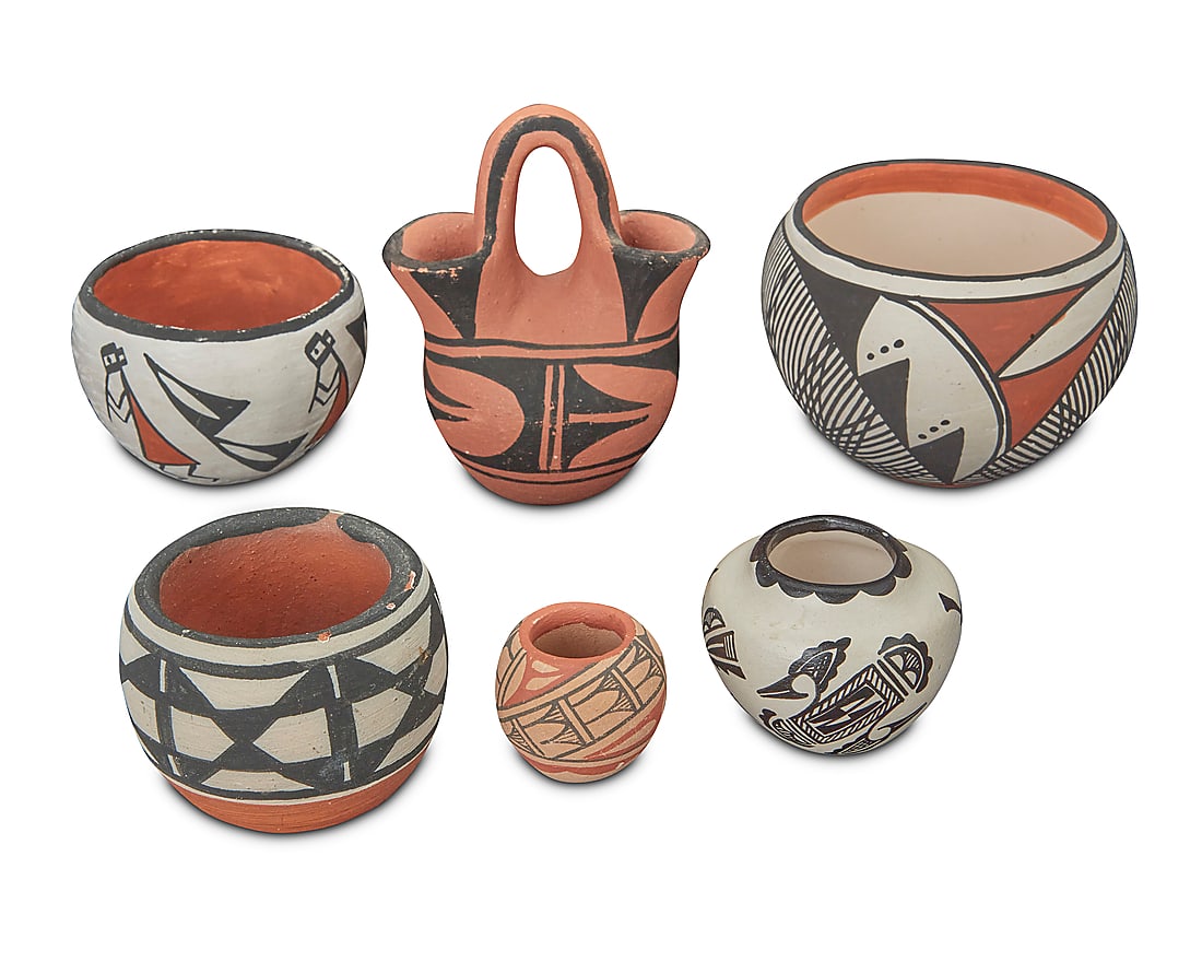 A group of six small Pueblo pottery vessels: A group of six small Pueblo pottery vessels Six works: Vivian Seymour (b. 1960, Acoma Pueblo) A polychrome fine line jar, late 20th/early 21st century Signed to underside: V. SEYMOUR / ACOMA, NM With 