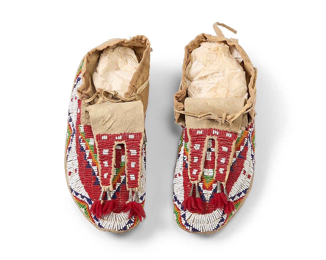 A pair of Sioux beaded hide moccasins (1 of 3)