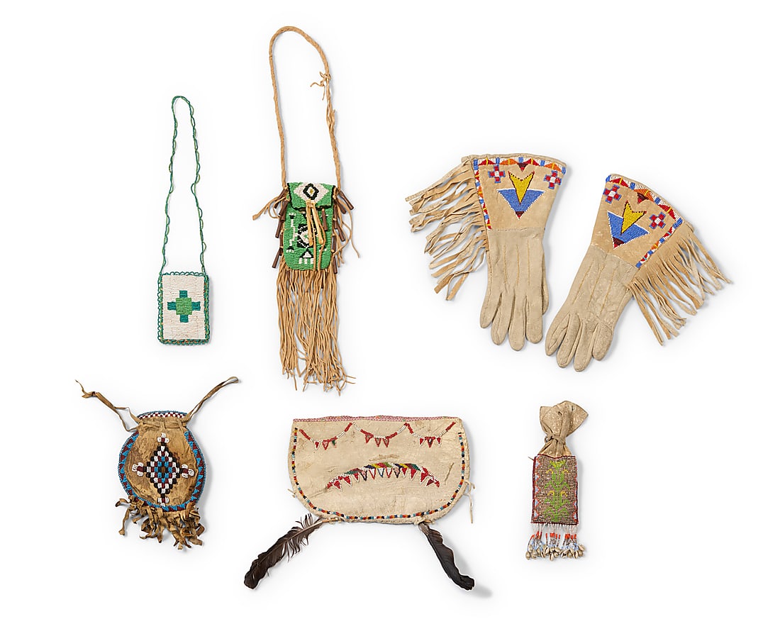 A group of Native American beaded hide items (1 of 2)
