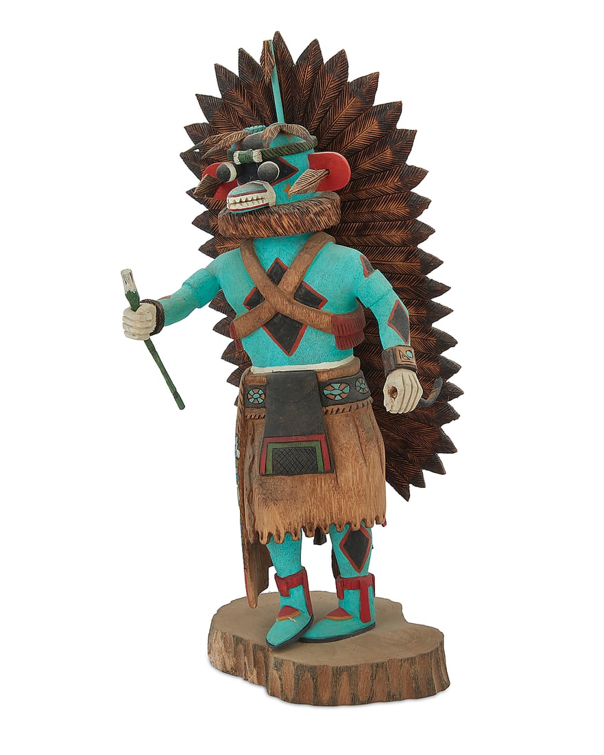 Tino Youvella (b. 1940, Hopi-Tewa/Laguna Pueblo), A polychrome carved cottonwood "Blue Ahite": Tino Youvella (b. 1940, Hopi-Tewa/Laguna Pueblo) A polychrome carved cottonwood "Blue Ahite" katsina, late 20th century Signed and inscribed to underside: [artist's sun cipher] / Tino Youvella / Blue