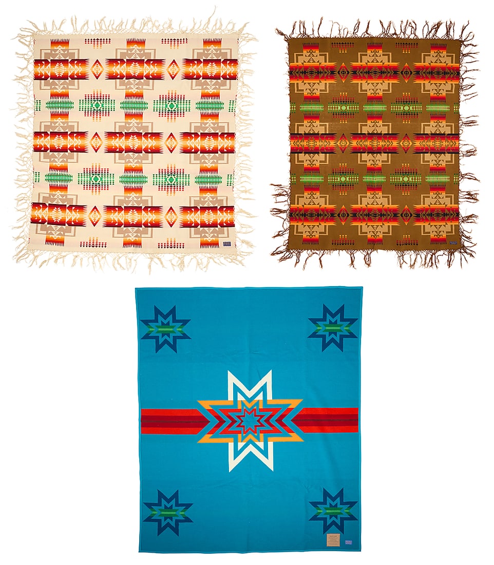 Three Pendelton wool blankets: Three Pendelton wool blankets Late 20th century Each with factory tag indicating fiber content; one further tagged with pattern title and inscription Comprising two blankets in the "Chief Joseph"