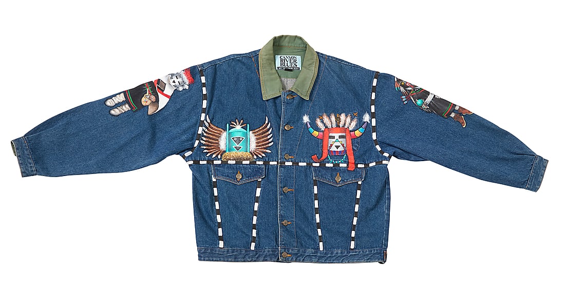 A painted denim jacket, attributed to Marilyn Shula Sakeva, Hopi-Tewa: A painted denim jacket, attributed to Marilyn Shula Sakeva, Hopi-Tewa Marilyn Shula Sakeva (1955-2019, Hopi-Tewa) Late 20th/21st century A Trader Bay custom jean jacket with Hopi dancer motifs With Ca
