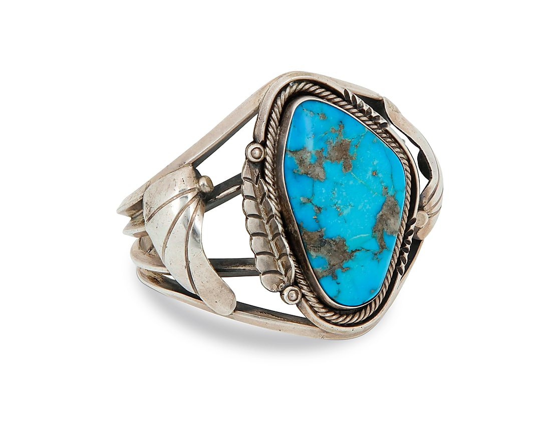 A Southwest sterling silver and turquoise cuff bracelet (1 of 3)