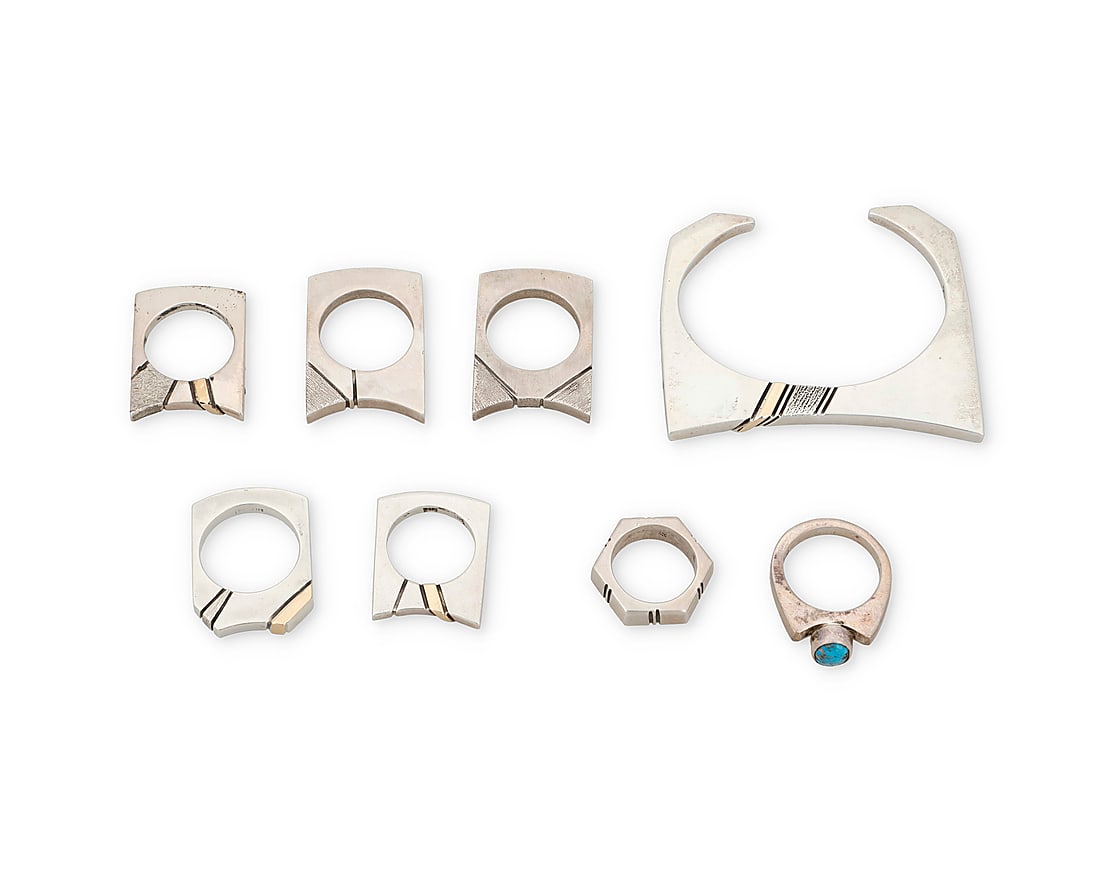 A group of sterling silver and 14K gold jewelry: A group of sterling silver and 14K gold jewelry Nusie Henry [Belon] (b. 20th century, Dine) Late 20th century Most stamped: Sterling / 14K; tags denote Nusie Henry and G. King as artists Comprising a 