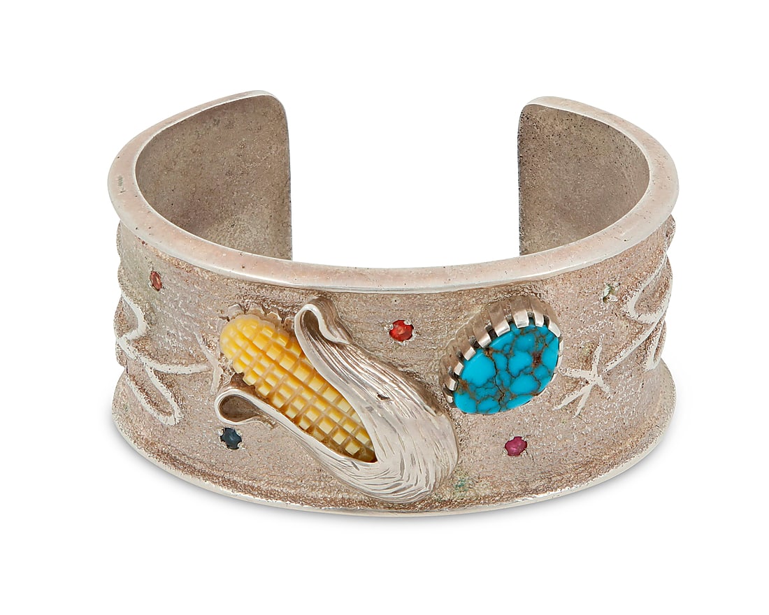 A Southwest cast sterling silver and gem-set cuff bracelet (1 of 4)