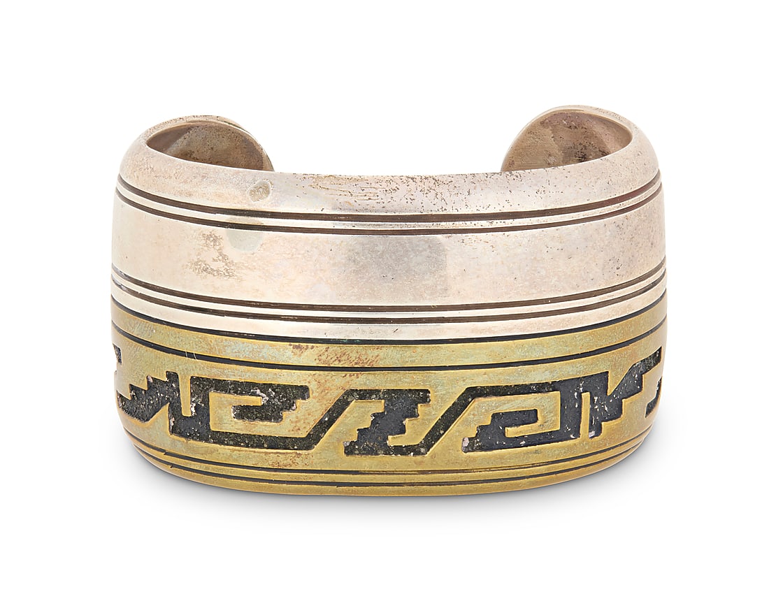 A Tommy Singer Navajo sterling silver & brass overlay cuff bracelet (1 of 2)