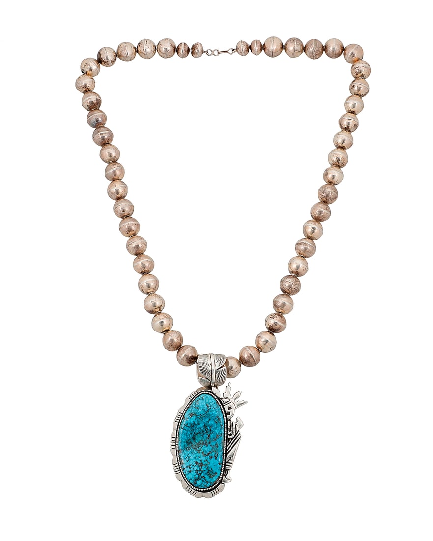 An Esther Wood Navajo sterling silver and turquoise pendant (1 of 3)