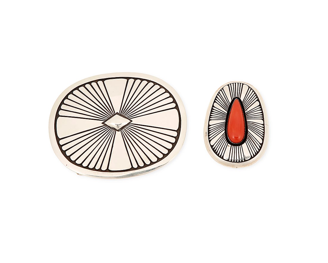 A set of Herman Vandever Navajo sterling silver jewelry: A set of Herman Vandever Navajo sterling silver jewelry Herman Vandever (b. 1964, Dine) Late 20th/21st century Each with etched signature verso Comprising a sterling silver and set coral feathered