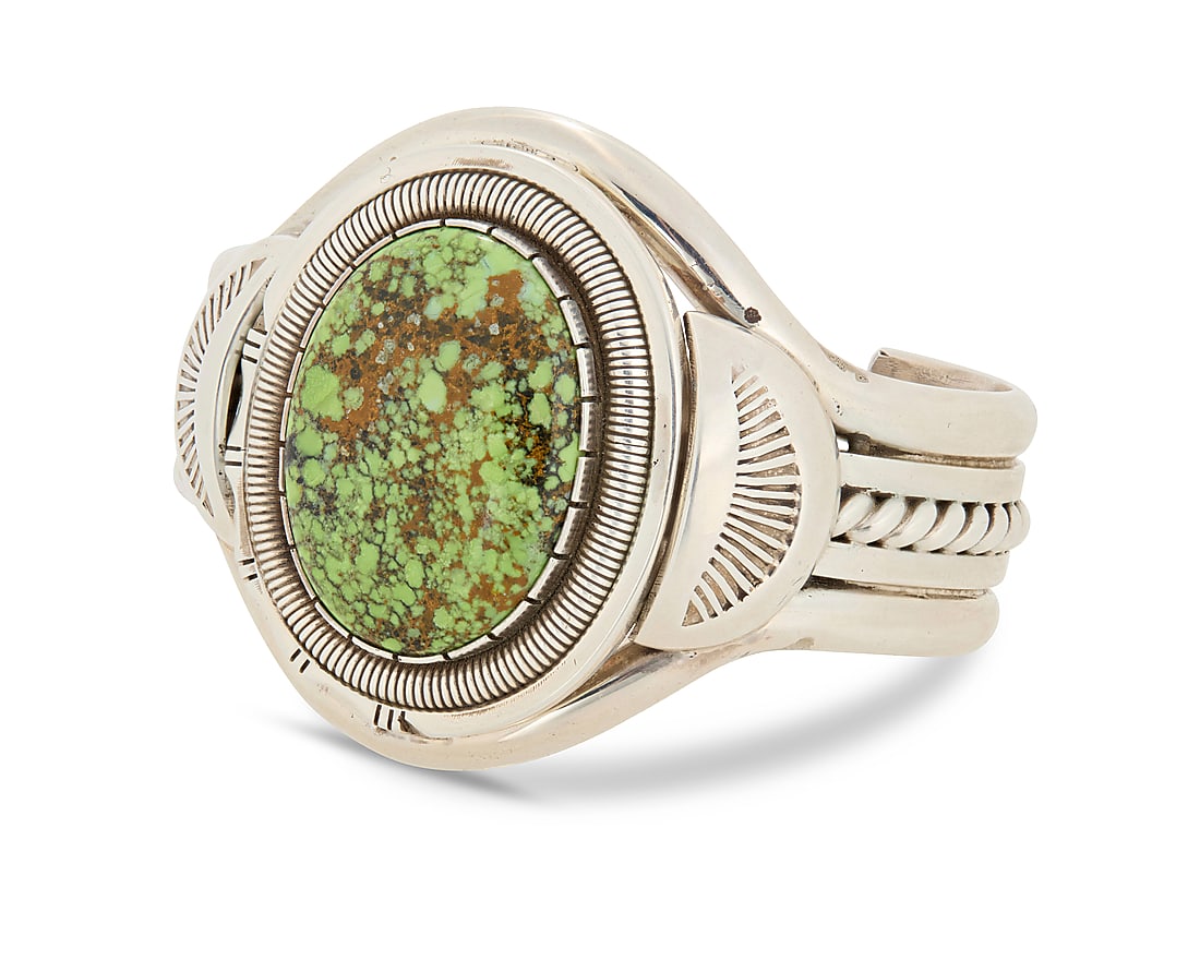 A Wilbert Vandever Navajo sterling silver and set stone cuff bracelet: A Wilbert Vandever Navajo sterling silver and set stone cuff bracelet Wilbert [William] Vandever (1951-2018, Dine) Late 20th/21st century Stamped: WCV [within a feather] A heavy five wire cuff with