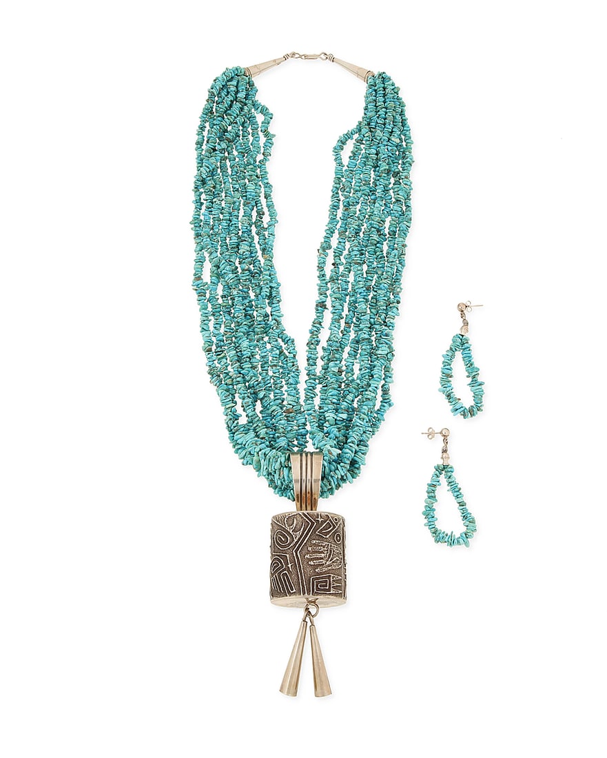 A set of Pueblo style silver and turquoise jewelry: A set of Pueblo style silver and turquoise jewelry Late 20th century Unmarked Comprising a ten-strand turquoise necklace suspending a large sandcast sterling silver cylindrical barrel pendant with