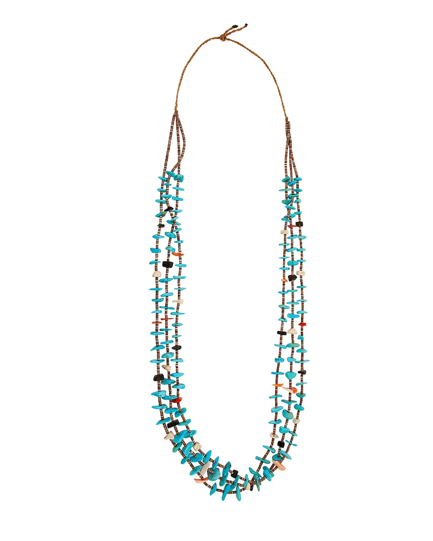 A Pueblo style turquoise and heishi necklace: A Pueblo style turquoise and heishi necklace Mid/late 20th century Unmarked Comprising a three-strand necklace with graduated small tab turquoise alternating with various stone and shell beads, with h