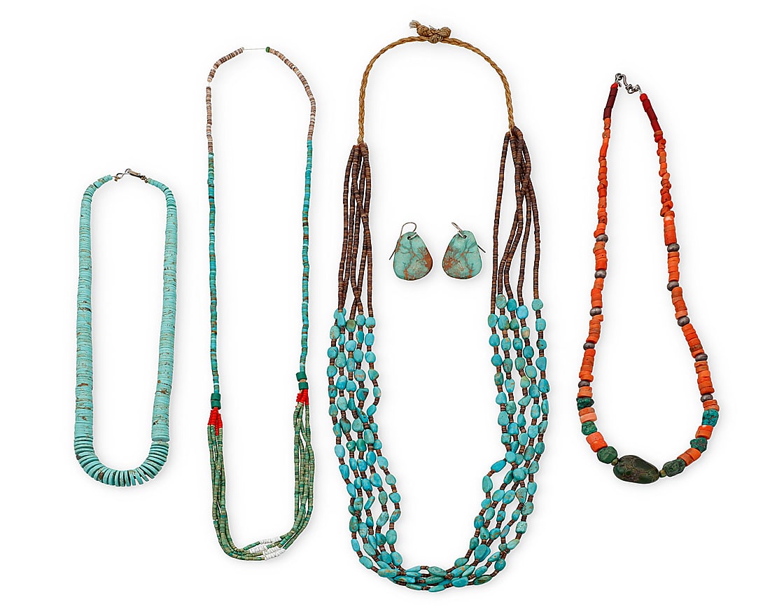 A group of Pueblo style necklaces: A group of Pueblo style necklaces Mid/late 20th century Unmarked Six works comprising a chunky graduated rolled turquoise necklace (20.5" L), and a coral, turquoise, and greenstone single strand