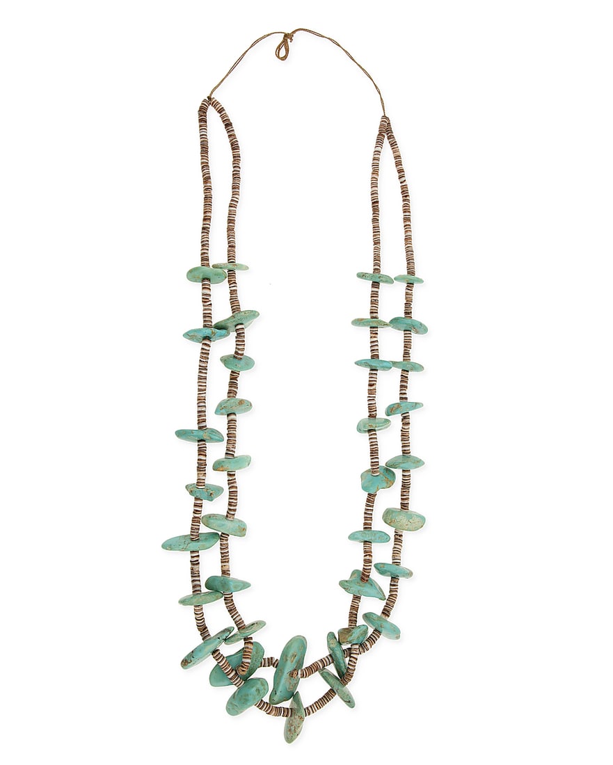 A Pueblo turquoise necklace: A Pueblo turquoise necklace Mid/late 20th century Unmarked Comprising a chunky double strand necklace with large graduated tab turquoise alternating with heishi spacers 36" L 222.4 grams gross