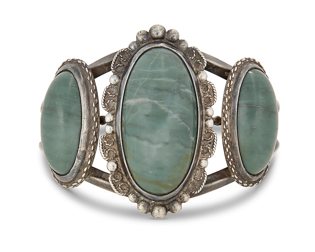 A Southwest style sterling silver and set hardstone cuff bracelet (1 of 2)