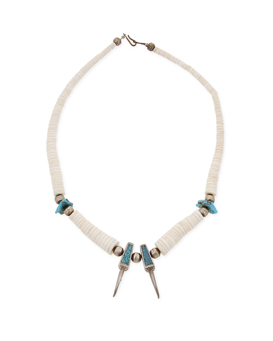 A Southwest style heishi shell and silver 'bear claw' necklace (1 of 2)