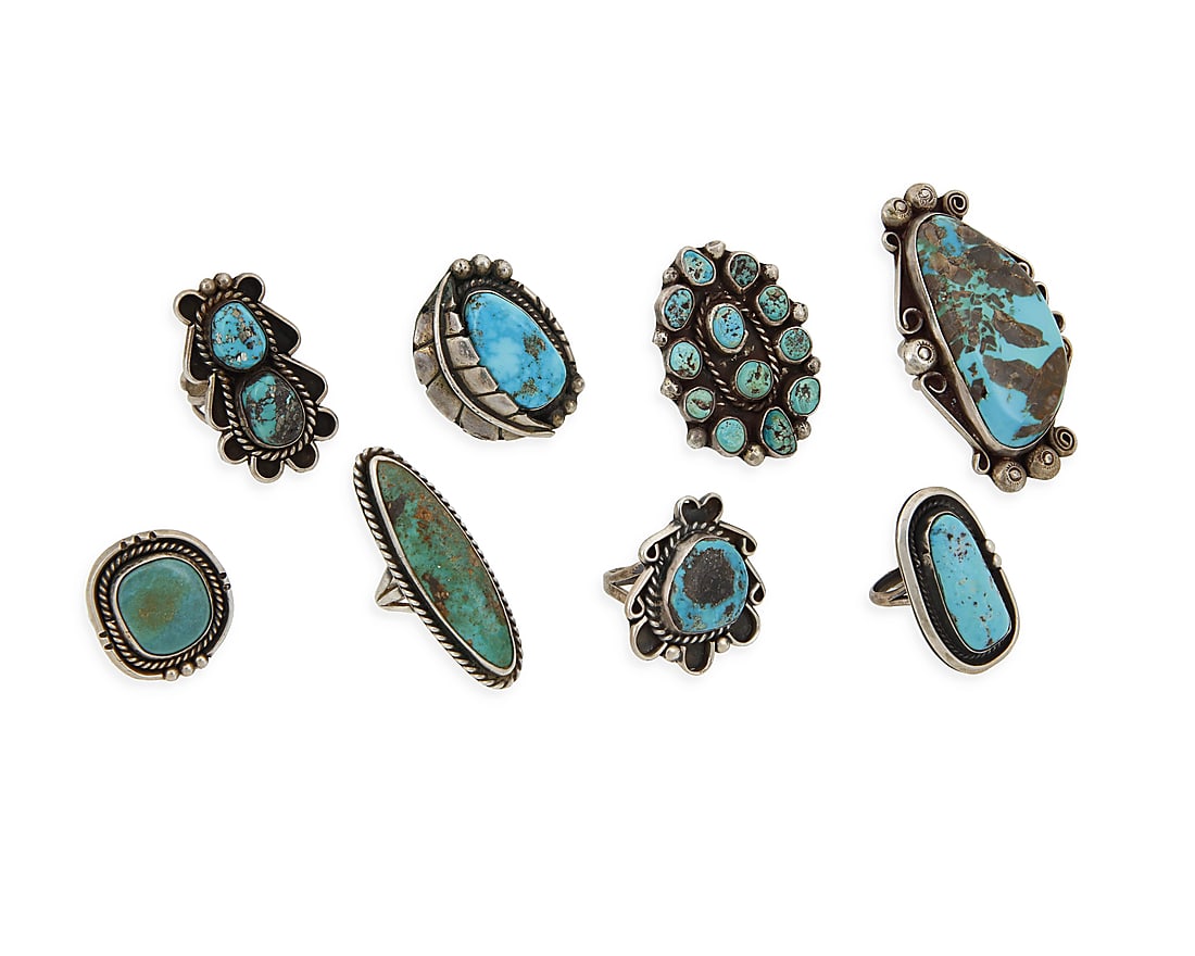 A group of large Southwest silver and turquoise rings: A group of large Southwest silver and turquoise rings Mid/late 20th century Two variously stamped: [feather pictograph] / YTH with in a circle Eight turquoise rings in various styles and sizes includi