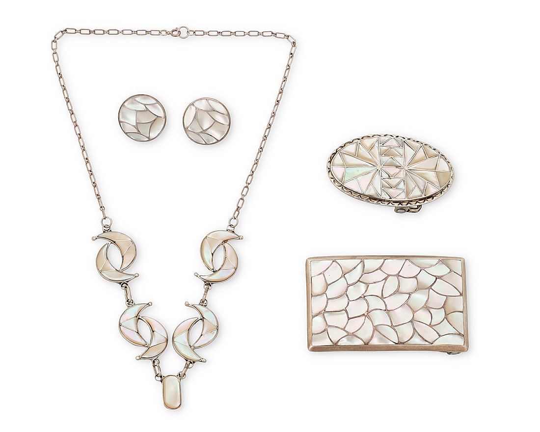A group of Southwest style mother of pearl jewelry: A group of Southwest style mother of pearl jewelry Late 20th/21st century Four works: Nicholas & Theresa Leekela (b. 20th century, Zuni Pueblo) A Zuni sterling silver and mother of pearl channel inlay