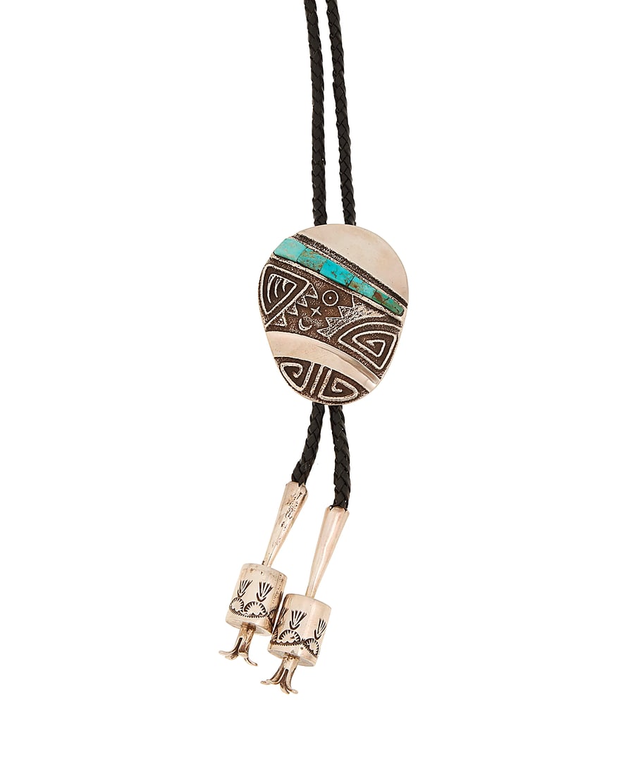 A Harold Lovato Kewa/Santo Domingo Pueblo cast silver and turquoise bolo tie (1 of 2)