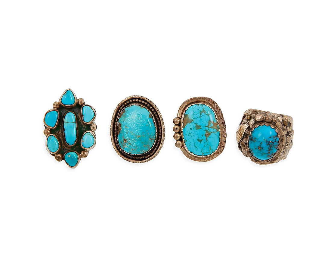 A group of Southwest style silver and turquoise rings (1 of 4)