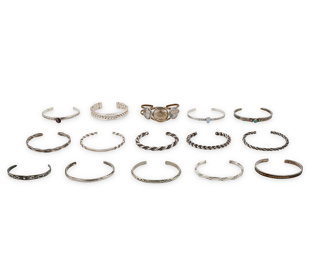 A large group of Southwest style silver bracelets (1 of 1)