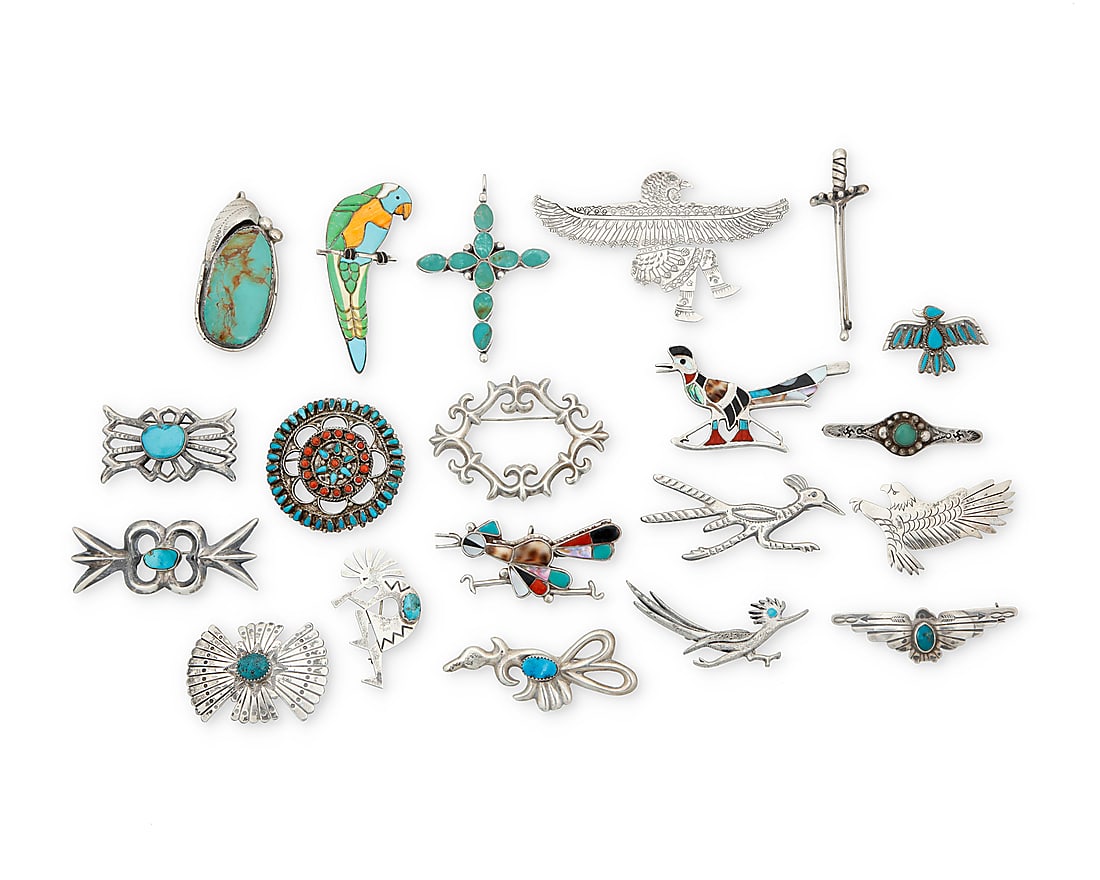 A large group of Southwest style silver brooches (1 of 1)