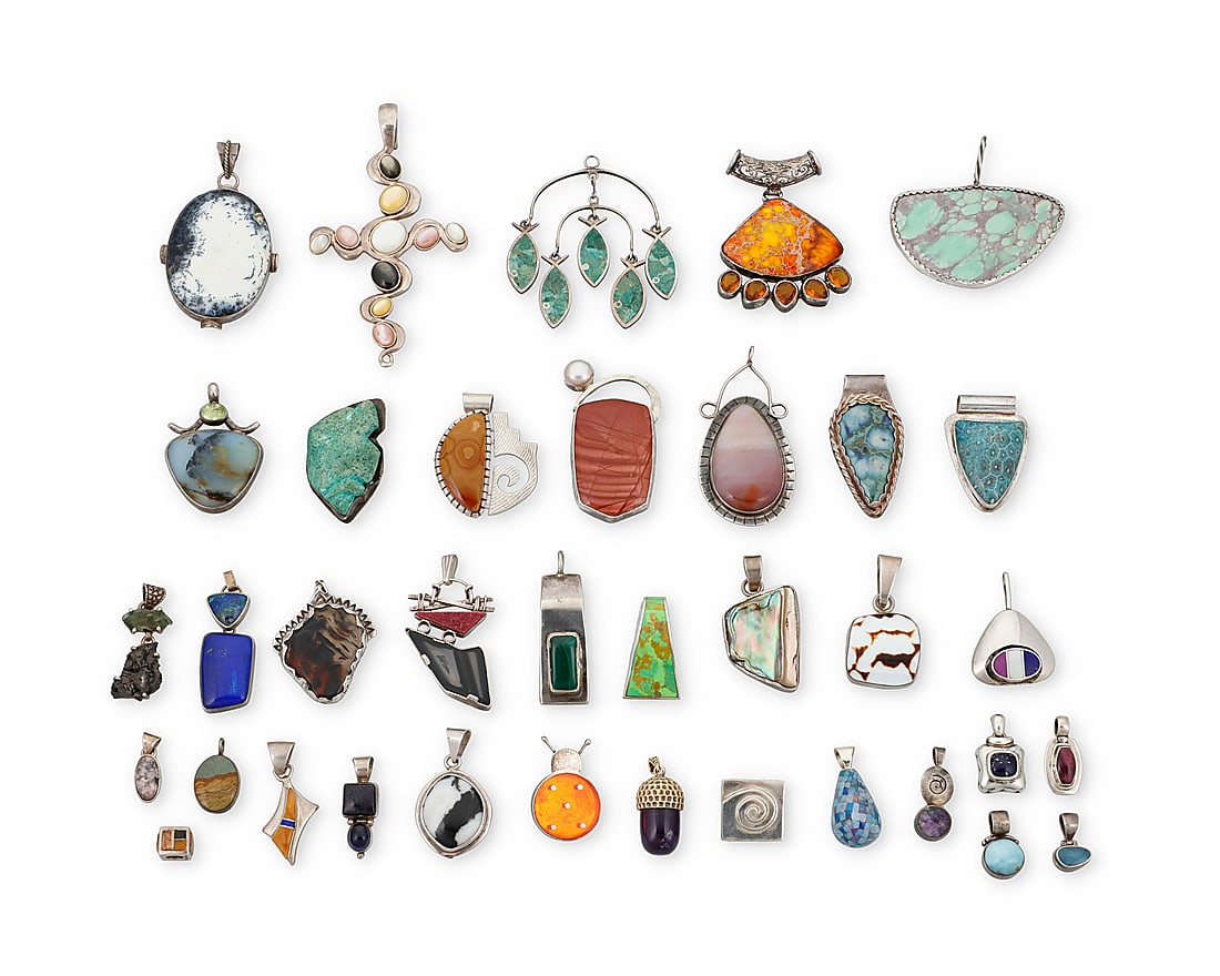 A group of Southwest style silver and set stone pendants (1 of 1)