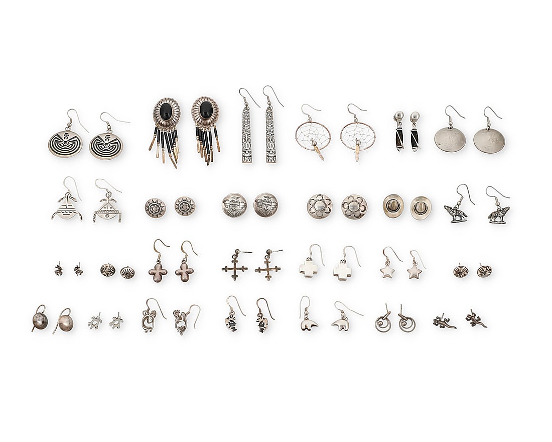 A large group of Southwest style silver earrings (1 of 1)