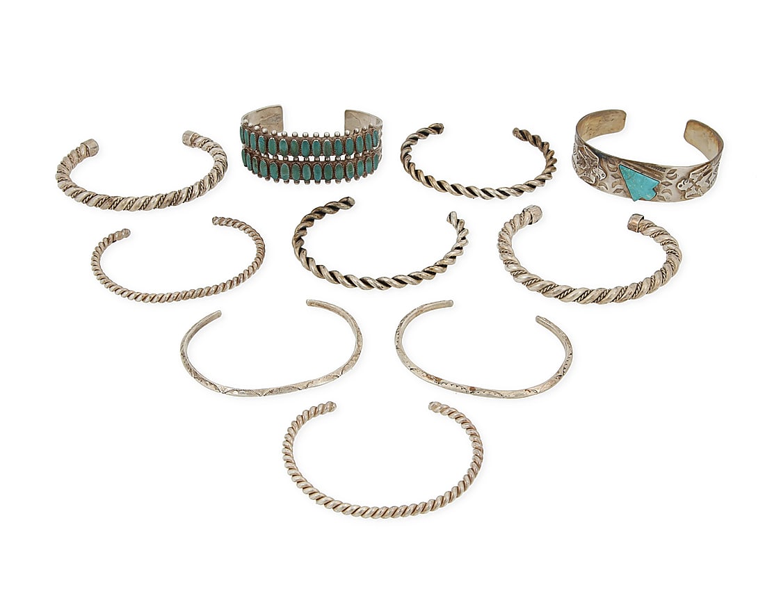 A group of Southwest style silver cuff bracelets (1 of 3)
