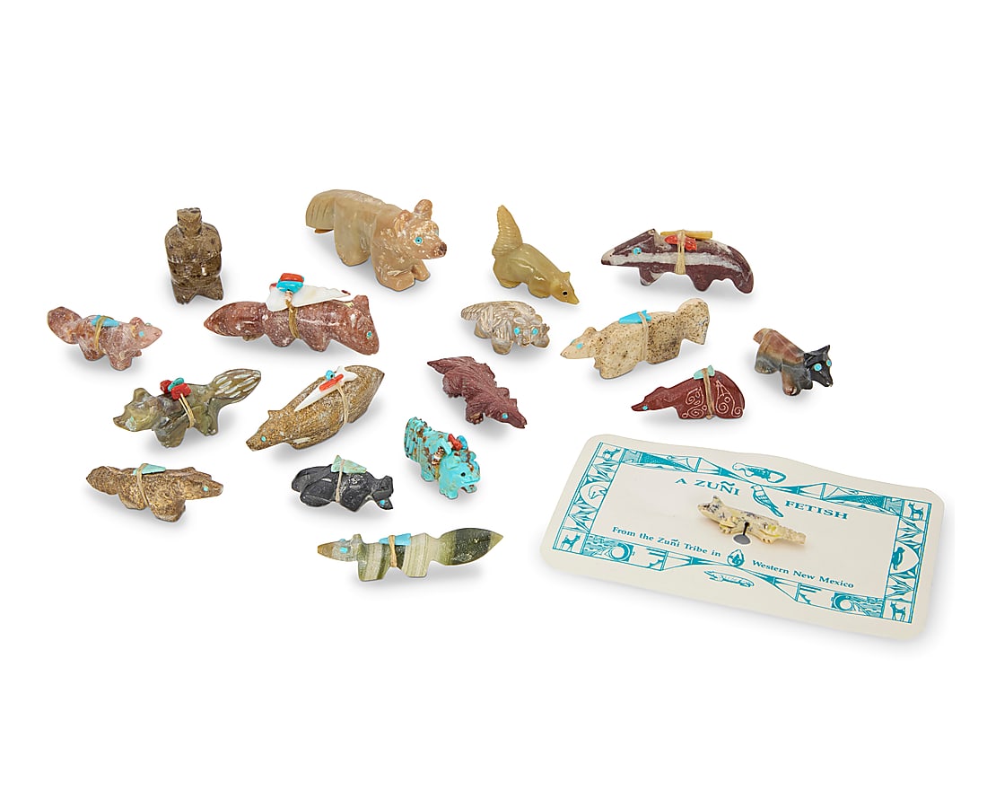 A large group of Zuni carved stone mammalian fetishes: A large group of Zuni carved stone mammalian fetishes Mid/late 20th century, mostly Zuni Pueblo Most variously incised with signature, initials, or artist's cipher Comprising primarily foxes, from art