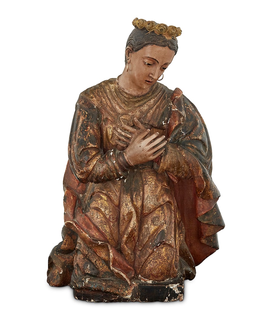 A Spanish Colonial polychrome carved wood santo bulto: A Spanish Colonial polychrome carved wood santo bulto 19th century With gilt and painted designs in the robe, surmounted by a gold-toned bronze crown and adorned with metal earrings 22.5" H x 16" W x
