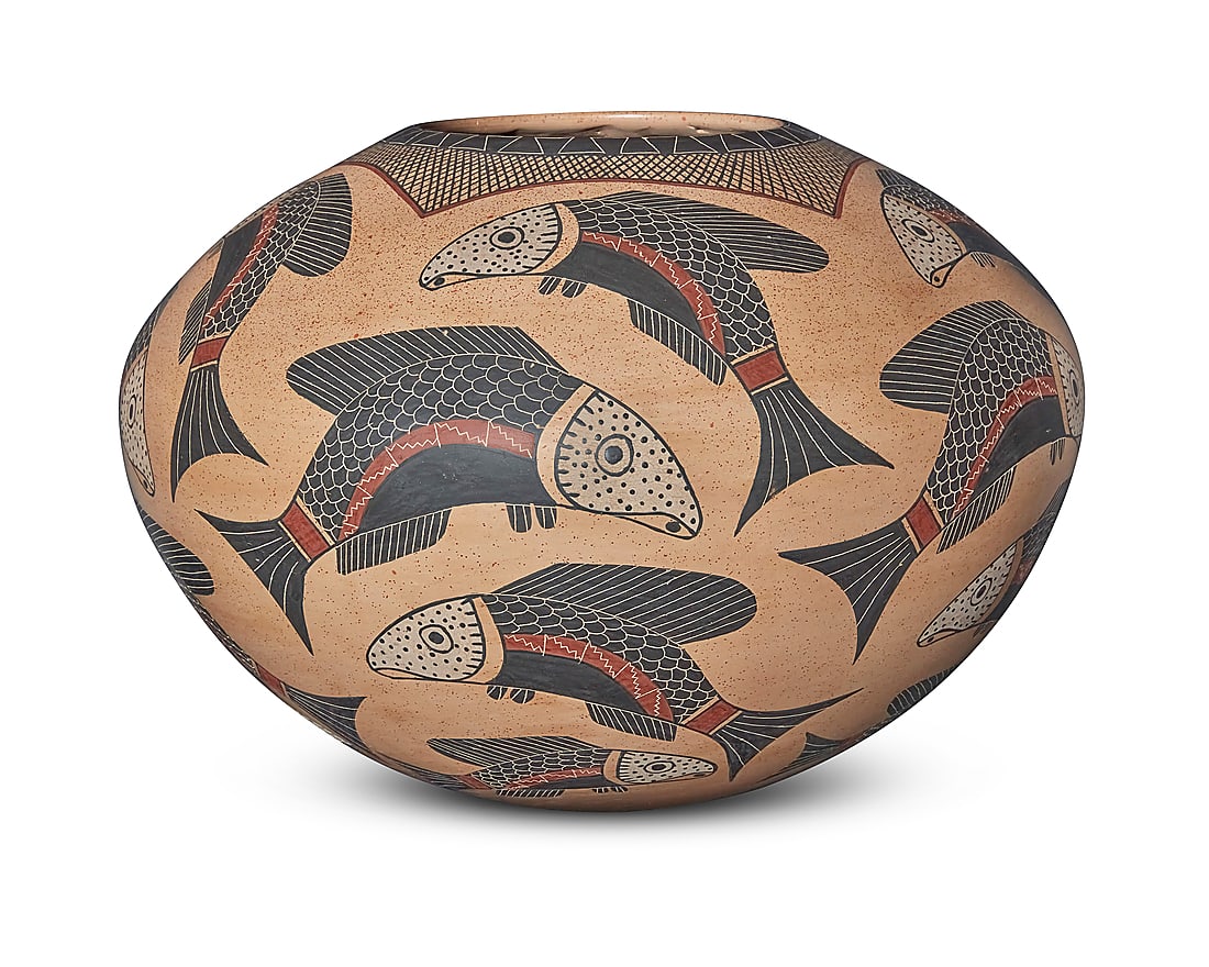 Roberto Banuelos (b. 20th century, Mata Ortiz), A polychrome pottery jar, late 20th century: Roberto Banuelos (b. 20th century, Mata Ortiz) A polychrome pottery jar, late 20th century Incised to underside: Roberto Banuelos With red, black, and white fish motifs on a cream ground 7.25" H x 10.