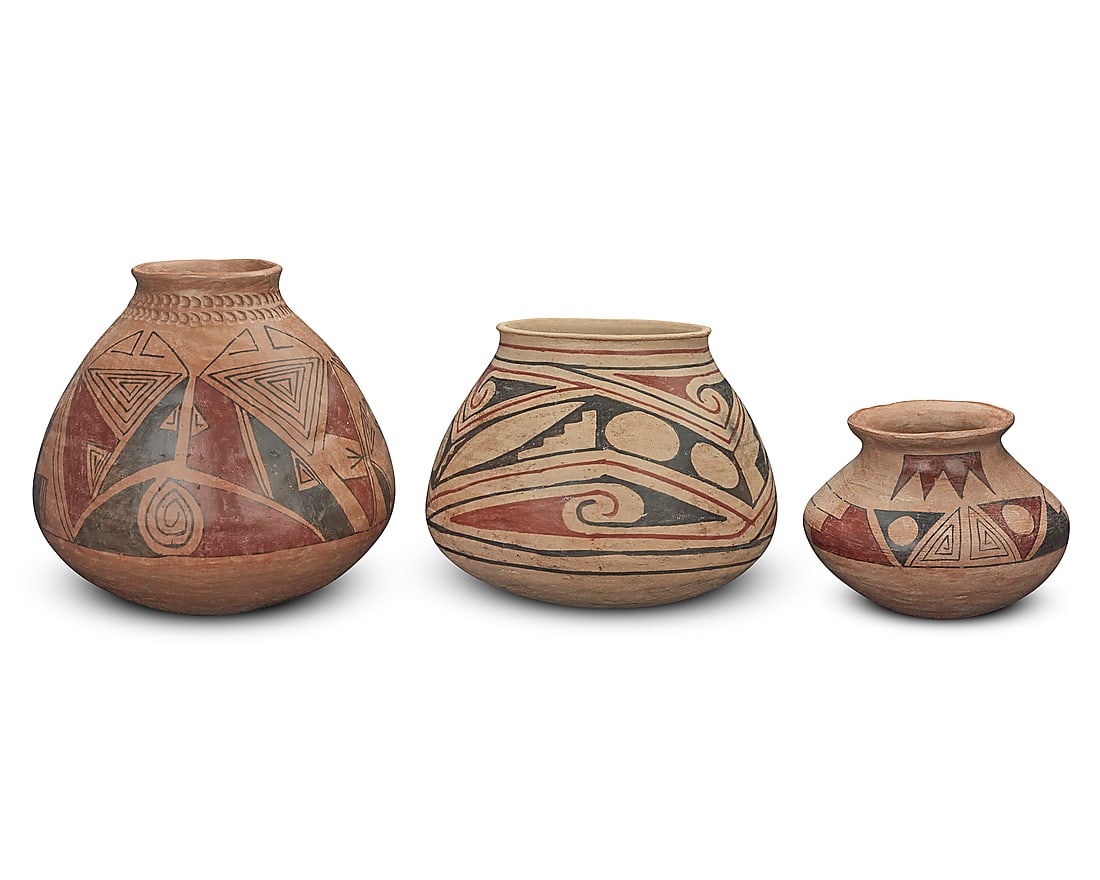 Three Casas Grandes-style polychrome pottery ollas: Three Casas Grandes-style polychrome pottery ollas Mid-20th century One deeply incised to underside: Manuel Olivas Comprising one by Manuel Olivas (b. 1940, Mata Ortiz) and two others, each with red a