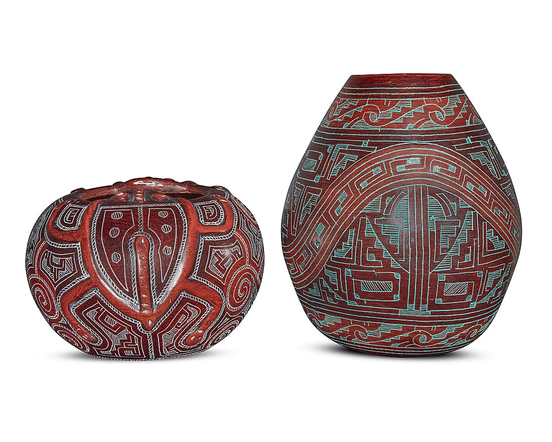 Two Brazilian Marajoara-style sgraffito pottery jars: Two Brazilian Marajoara-style sgraffito pottery jars Late 20th century Each with incised signature: MARIVALDO; one dated: 96 Each incised with geometric designs, comprising one sculpted with two frogs