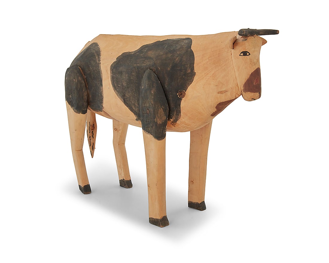 Attributed to Manuel Jimenez Ramirez (1919-2005, Mexican), A polychrome carved copal wood cow: Attributed to Manuel Jimenez Ramirez (1919-2005, Mexican) A polychrome carved copal wood cow alebrije, mid/late 20th century; Oaxaca, Mexico Unmarked 8.25" H x 13" W x 3.625" D