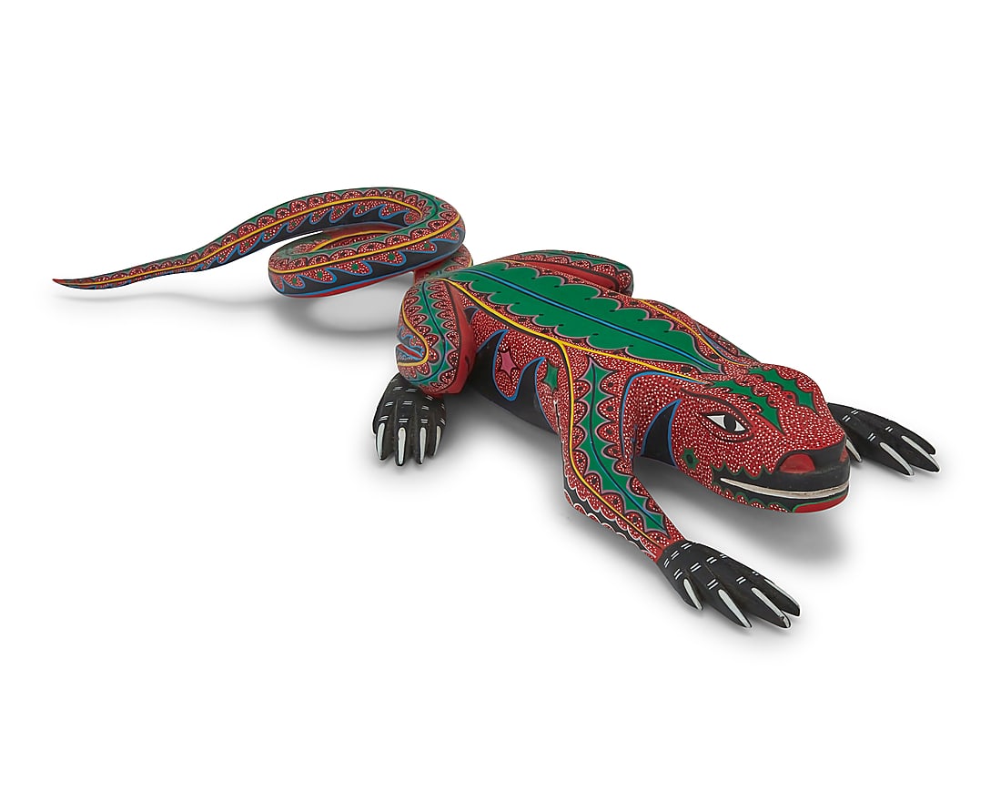 Gerardo Ramirez Morales (b. 1953, Mexican), A polychrome carved cedar iguana alebrije, late 20th: Gerardo Ramirez Morales (b. 1953, Mexican) A polychrome carved cedar iguana alebrije, late 20th century; Oaxaca, Mexico Signed and inscribed: Gerardo Ramirez M / Arte Mexicano / Oaxaca _ Mexico 2.5" H