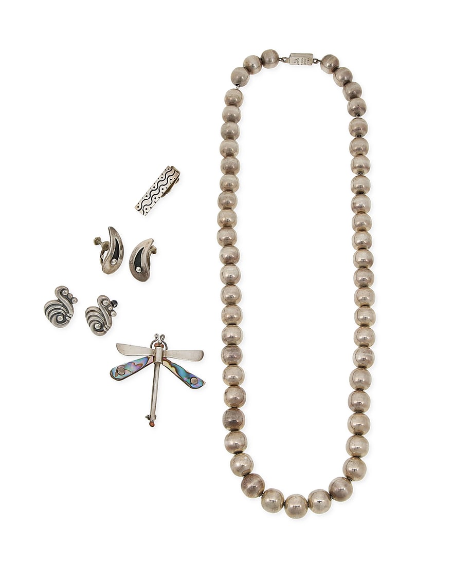 A group of Mexican silver jewelry: A group of Mexican silver jewelry Mid/late 20th century Variously marked for Mexico, Taxco, and sterling; further variously marked: 543 [design no.] / EAC / PA / [Eagle 3] / Beto / Alicia / TN-13 Five