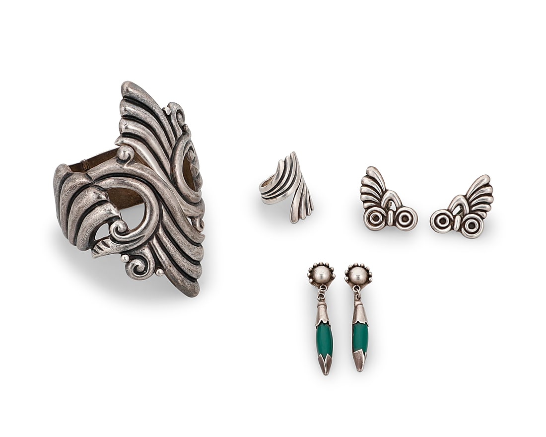 An assembled suite of Mexican silver jewelry: An assembled suite of Mexican silver jewelry Mid/late 20th century Each variously marked for maker, Mexico, and for sterling: E.D.P. Taxco / JSE / A. Cazares / YM Four works in sterling silver compris