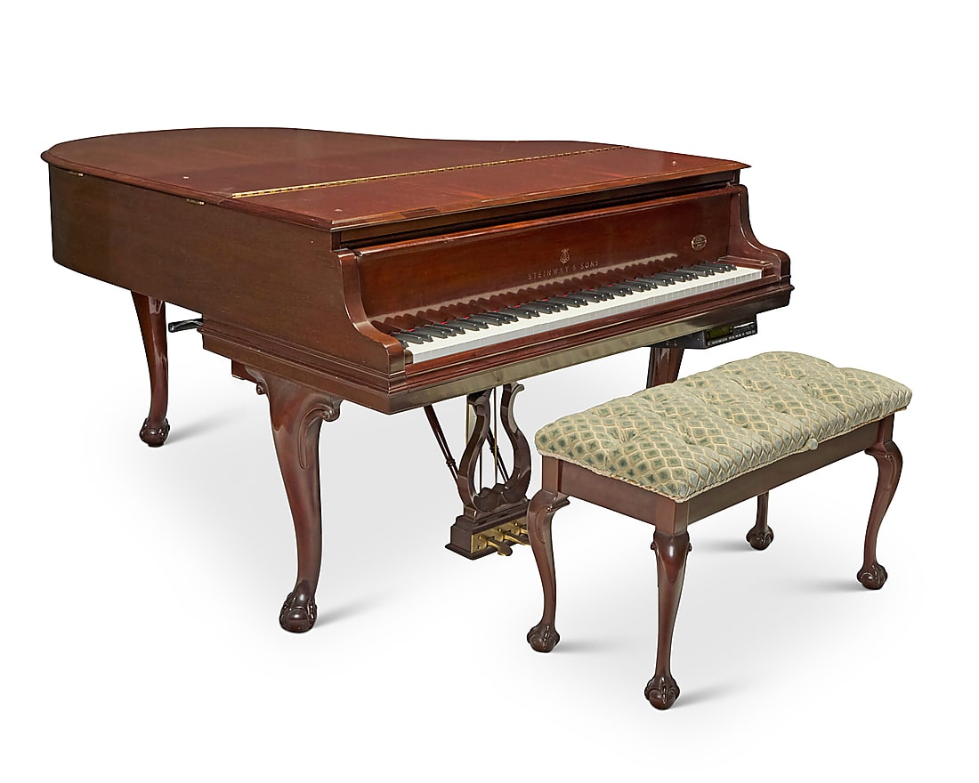 A Steinway & Sons mahogany model 'M' baby grand piano Circa 1997, serial number M 538952 Inscribed: A Steinway & Sons mahogany model 'M' baby grand piano Circa 1997, serial number M 538952 Inscribed above the keyboard: Steinway & Sons; further inscribed to metal plaque: THE CROWN JEWEL COOLLECTION; 