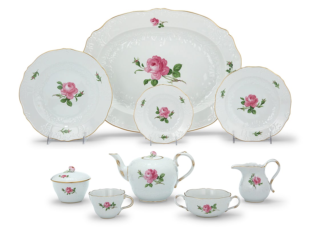 A Meissen porcelain 'Rose Pink' dinner and tea service Late 20th century Each with underglaze blue: A Meissen porcelain 'Rose Pink' dinner and tea service Late 20th century Each with underglaze blue cross swords and marked in red: 020110; variously impressed for pattern and shape Comprising: 12 dinn