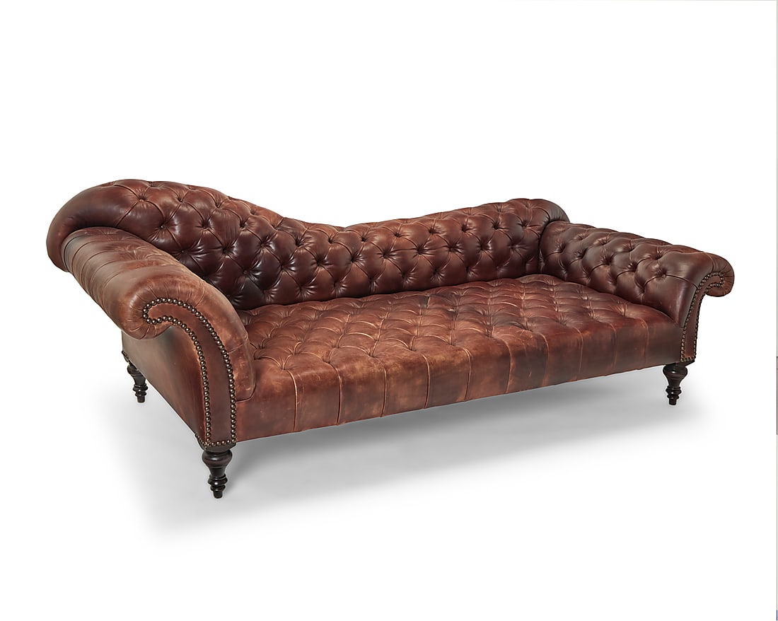 A George Smith tufted leather chaise Late 20th century With metal tag: GEORGE SMITH / HANDMADE BY: A George Smith tufted leather chaise Late 20th century With metal tag: GEORGE SMITH / HANDMADE BY CRAFTSMEN / NEWCASTLE ENGLAND With brass tacking 34" H x 95" W x 44" D