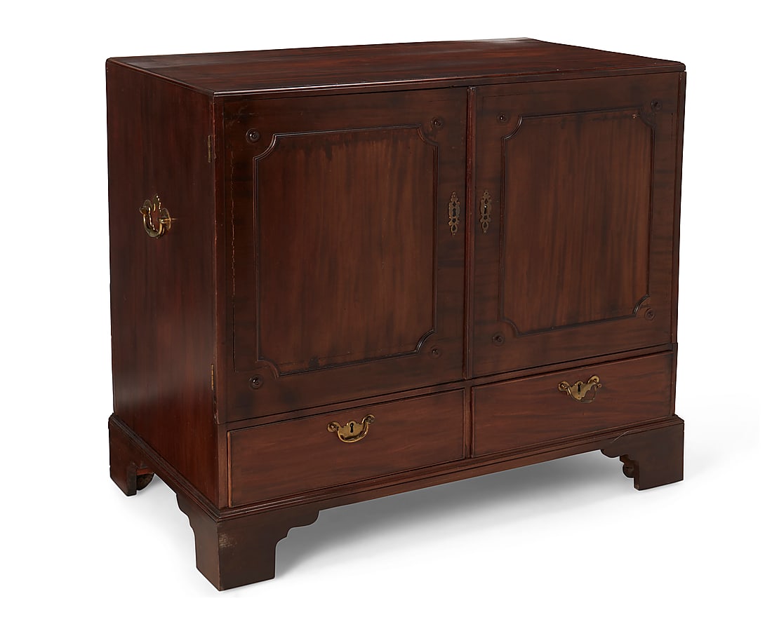 A George III style mahogany cabinet 20th century Enclosed by a pair of cupboard doors, opening to (1 of 8)
