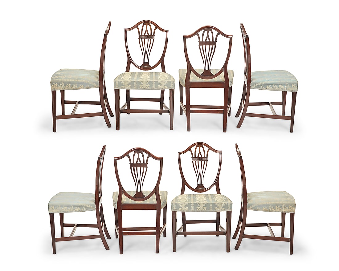 A set of eight George III style mahogany side chairs Early 20th century Each with shield-back and: A set of eight George III style mahogany side chairs Early 20th century Each with shield-back and seat upholstered in a floral pattern fabric with passementerie trim 8 pieces Each: 37.75" H x 22" W x 